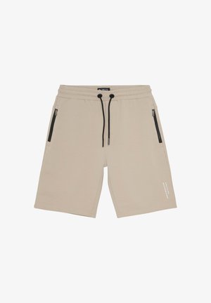 Beige katoenen shorts met een comfortabele tailleband, een trekkoordsluiting en ritszakken. Heeft geprinte tekst op het rechterbeen onderaan.