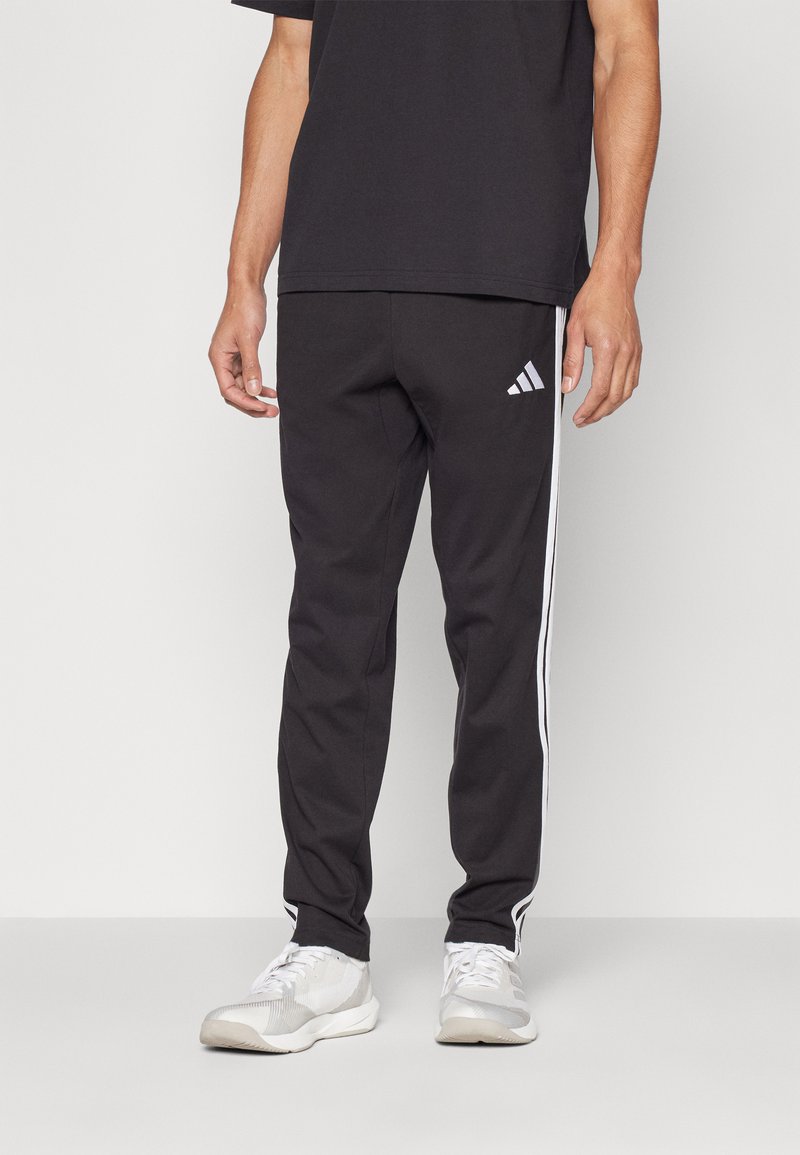 adidas Sportswear - ESSENTIAL THREE STRIPES SINGLE  - Tracksuit bottoms - black/white, Enlarge
