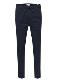 Navy blue lightweight trousers with an elastic waistband and drawstring. Features tapered legs and no visible pockets. Smooth texture.