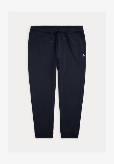 Marineblaue Sweatpants aus weichem Material, mit einem verstellbaren Gummizugbund, gerippten Bündchen und einem kleinen gestickten Logo an der Seite.