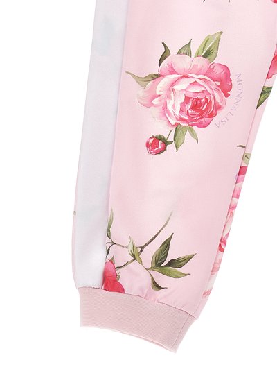 Ροζ υφασμάτινο μανίκι με τυπωμένα μεγάλα ροζ τριαντάφυλλα και πράσινα φύλλα, ριμπ λάστιχο στο τελείωμα και διακριτικό κείμενο "MONNALISA" κοντά στο λουλούδι.