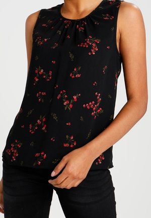 Top nero senza maniche con scollatura arricciata, caratterizzato da un motivo floreale in rosso e verde, realizzato in tessuto leggero.