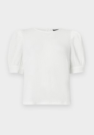 Hvit teksturert kortermet topp med rund hals, med pufferm og et subtilt rynkedesign.