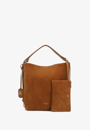 Pruunist sametist käekott laia, pehme siluetiga ja nahkrihmaga, millele on lisatud sobiv väike rahakott. Tuntu on sile tekstuur.