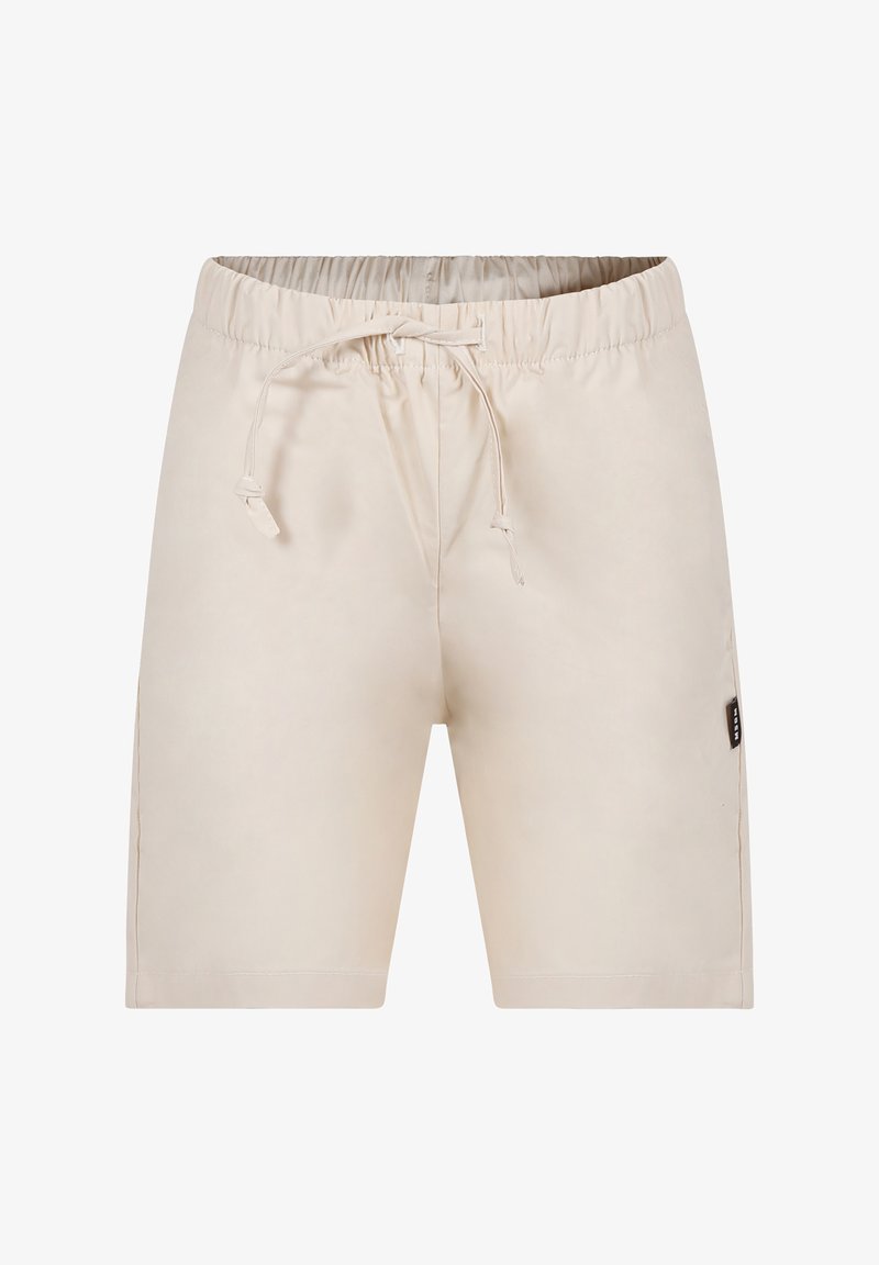 Pantaloni corti beige con elastico in vita e coulisse. Tessuto morbido, lunghezza al ginocchio, tasche laterali e una piccola etichetta del marchio di lato.