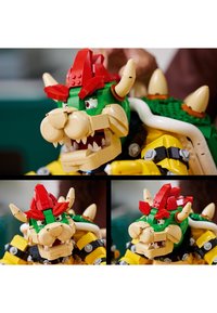 LEGO figure of a character with a green and yellow body, red spikes, beige details, and prominent horns, showcasing intricate block design.