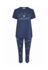 Marinblå bomullspyjamas med kortärmad topp med texten "FREE SPIRIT DREAMER" och byxor med stjärnmönster och metalliska detaljer.