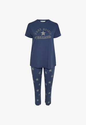 Marine blødt bomulds natdragt sæt med en kortærmet t-shirt, der har teksten "FREE SPIRIT DREAMER", og leggings med stjernes mønster og metalliske detaljer.