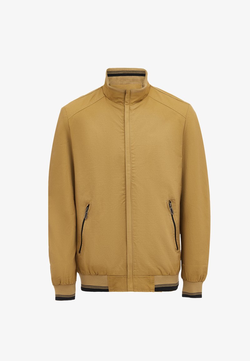 Lys brun zip-up jakke med standkrave, to sidelommer, elastiske manchetter og ribbet kant med sorte detaljer. Glat tekstur.