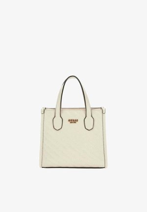 Sac à main matelassé couleur crème avec doubles poignées supérieures et logo Guess en métal à l'avant.