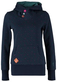 Mörkblå hoodie med polka prickar i teal och rosa, stor cowl-hals, tre-knappsstängning, framficka och en brun etikett på fållen.