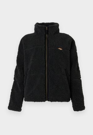 Must be fleece-jope kõrge kraega, tõmblukk ja tekstuuritud kangas. Omab kahte küljetaskut ja väikest logo aktsenti rinnal.