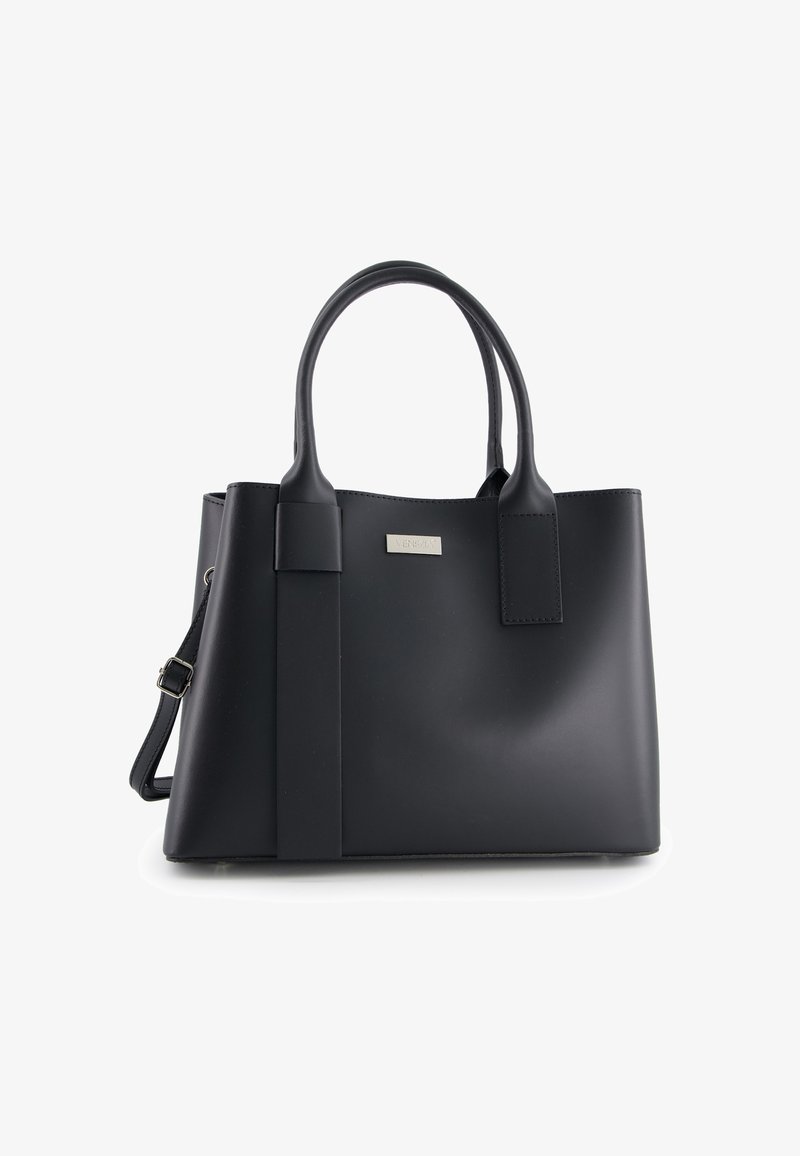 Black faux leather tote bag with double handles, an adjustable shoulder strap, and a metallic brand plaque. Features a structured shape and smooth texture.
