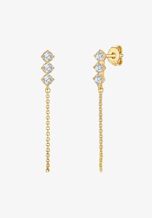 Arany tónusú csepp fülbevalók, három áttetsző drágakővel a tetején, egy finom lánccal összekötve, biztos tűs záródással.