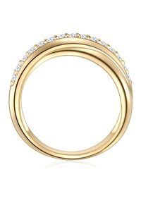 Zlatý prsteň s hladkým, lesklým povrchom, na vrchnom okraji je osadený radom malých, okrúhlych čírych kamienkov.