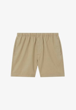 Pantaloncini beige con vita elastica, tasche laterali e cuciture minime, progettati per un uso casual.