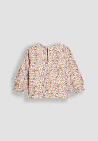 Langärmlige Bluse für Kleinkinder mit elastischen Bündchen und buntem kleinen Blumendesign in Pink, Orange, Gelb und Grün auf weißem Hintergrund.