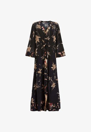 Czarna sukienka w kwiaty z długimi rękawami, dekoltem w serek, przewężoną talią i zwiewnym dołem. Posiada kwiatowe wzory w beżowych i różowych odcieniach.