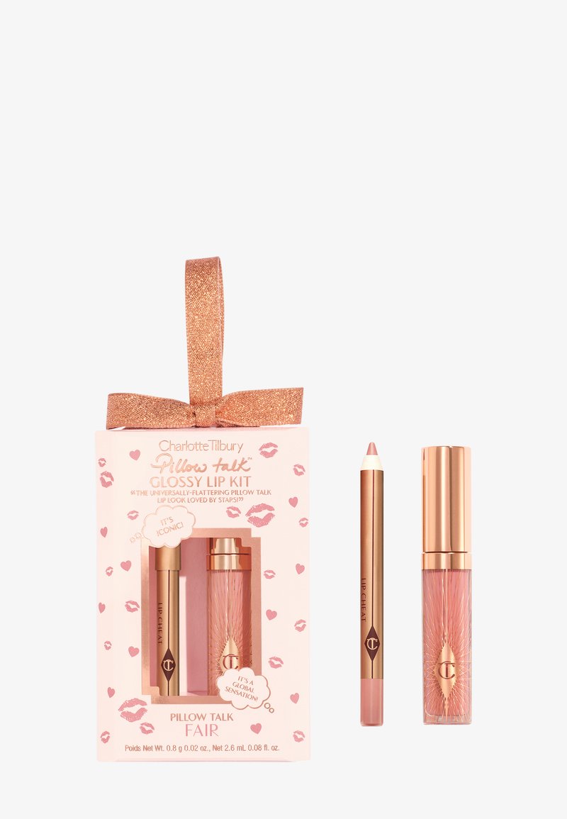 Charlotte Tilbury Pillow Talk Glossy Lip Kit in pink packaging with gold accents. Contains a lip liner, lip gloss, and lipstick.