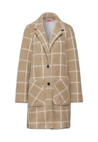 Abrigo de cuadros beige hecho de tela texturizada. Presenta un cuello con muescas, dos grandes bolsillos frontales y dos botones negros.