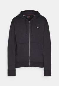 Felpa nera con zip, tasca frontale, cappuccio con cordino e piccolo logo Jumpman bianco sul lato sinistro del petto.