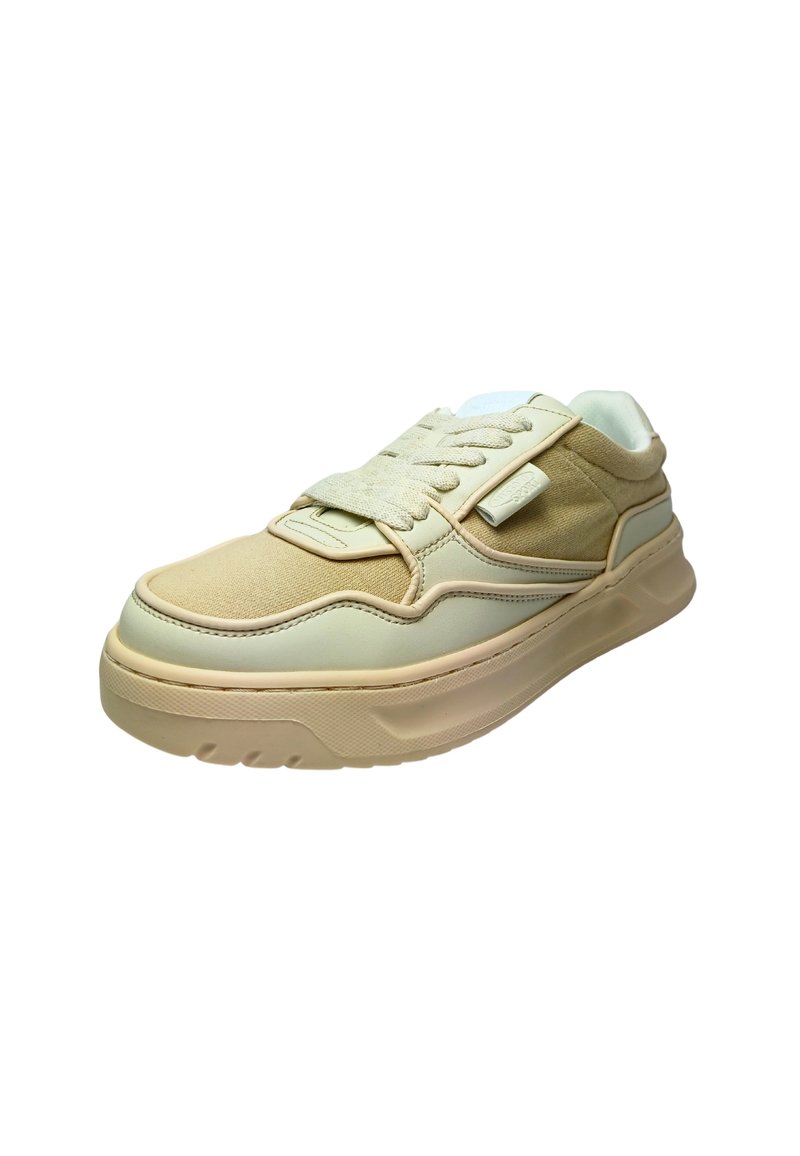 Beige sneaker with a textured upper, featuring a mix of soft fabric and smooth leather, rounded toe, cushioned sole, and lace fastening.