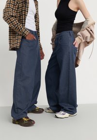 YOURTURN UNISEX - Baggy jeans - grey denim