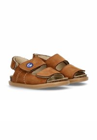 Sandali in pelle marrone con punta aperta, cinturini regolabili in Velcro e suola leggera. Presentano un logo circolare blu e cuciture a contrasto.
