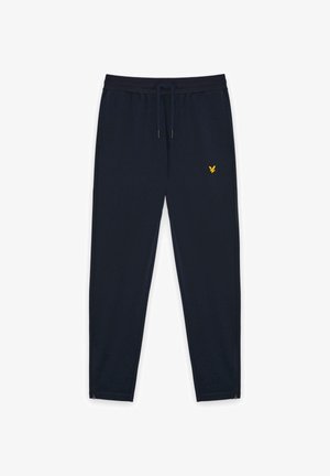 Pantaloni jogger blu navy con vita elastica, coulisse, tasche laterali, piccolo logo giallo a forma di aquila sulla coscia sinistra e cerniere alla caviglia.