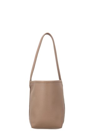 Lille beige læder spandtaske med én lang hank og en glat, let struktureret overflade.