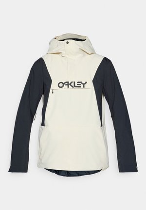 Witte en marineblauwe hoodie met het "OAKLEY" logo op de voorkant, uitgerust met een ritszak, elastische boorden en een langere achterkant.