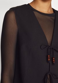 Vero Moda VMWAVE STRING WAISTCOAT - Strukirani kaput - black