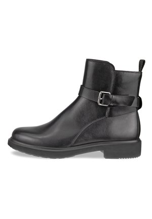 Black leather ankle boot with a rounded toe, side strap and buckle detail, textured upper, and a low, flat rubber sole.