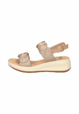 Sandalo beige con zeppa, con due cinturini intrecciati e cinturino alla caviglia con fibbia, dotato di sottopiede imbottito e suola in gomma.