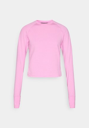 Long-sleeve, cropped top in light pink with a ribbed texture and striped pattern; features a round neckline and fitted cuffs.