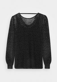 Blouse noire transparente à manches longues avec un col rond et un motif à petits pois en velours sur toute la surface, avec des manches bouffantes et des poignets boutonnés.