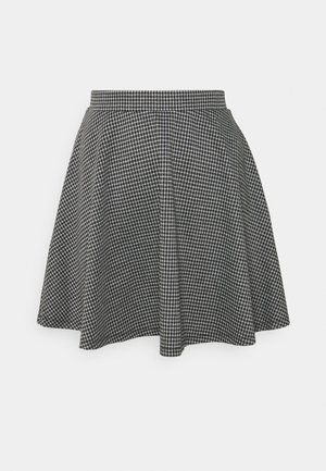 Black and white checkered skater skirt with a fitted waistband and flared hem, made of textured fabric displaying a classic pattern.