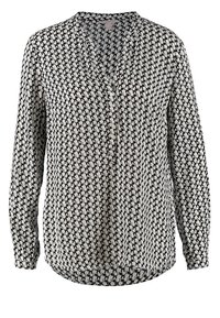 Bluzka z długim rękawem w czarno-białą kratę houndstooth. Zapięcie na guziki z przodu, dekolt w kształcie litery V, wykonana z gładkiego materiału o delikatnym połysku.