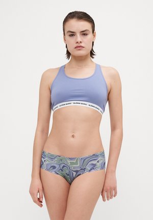 Light purple sports bra with a white band featuring "BJÖRN BORG." Matching patterned panties in green and blue swirls. Smooth fabric texture.