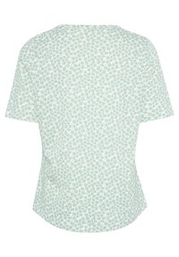Grön blommönstrad kortärmad topp med rund halsringning, tillverkad av lättviktsmaterial, med en något rundad fåll bak.