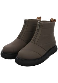 Brown ankle boots with front zippers, black thick soles, and orange pull tabs at the back, designed for casual wear.