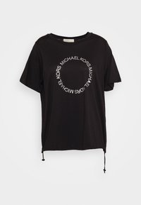 Camiseta de algodón negra con un diseño de logo redondo que dice "MICHAEL KORS" en texto blanco. Manga corta y cordón ajustable en el dobladillo.