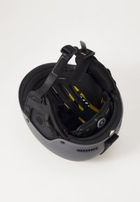 Gray helmet with a textured exterior, black interior adjustments, and yellow accents. Features interior padding and adjustable straps.