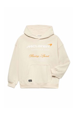 Beige McLaren hoodie met voorzak, witte en oranje "McLaren Formula 1 Team Racing Spirit" tekst op de borst.