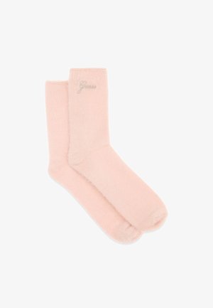 Calzini rosa chiaro morbidi con una texture soffice e dettaglio con logo ricamato. Lunghezza fino a metà polpaccio con punta senza cuciture per un comfort ottimale.