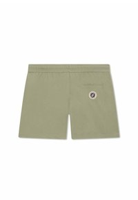 Shorts de bain verts avec une taille élastique, une poche arrière et un patch rond. Tissu lisse et léger de couleur unie.
