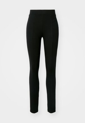 Melni legingi, izgatavoti no elastīga materiāla, ar augstu jostasvietu, šauru piegriezumu un divām priekšējām kabatām bez redzamām šuvēm.