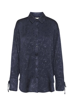 Donkerblauw knoop-overhemd met een gestructureerd patroon, lange mouwen en strikken bij de manchetten. Gemaakt van zacht fabric met een subtiele glans.