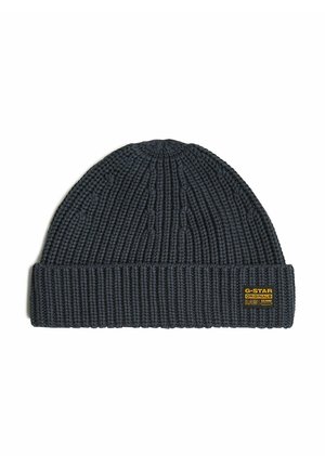 Bonnet en maille côtelée gris foncé avec un revers plié portant un petit patch jaune G-Star Originals sur le revers.