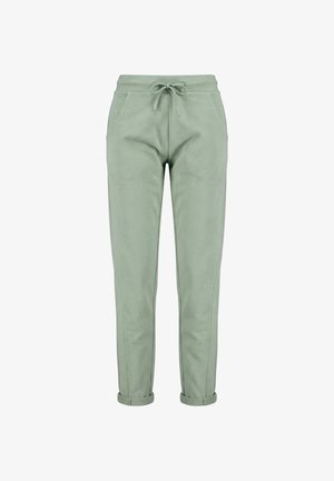 Pantalon de survêtement vert clair fuselé avec taille à cordon, poches latérales et ourlets retroussés, présenté de face sur fond blanc.